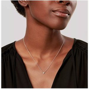 Tiffany and Co. single diamond pendant. Sterling silver.